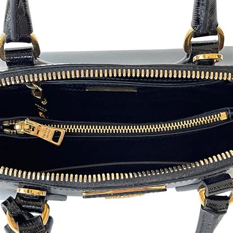 prada saffiano vernice promenade bag|More.